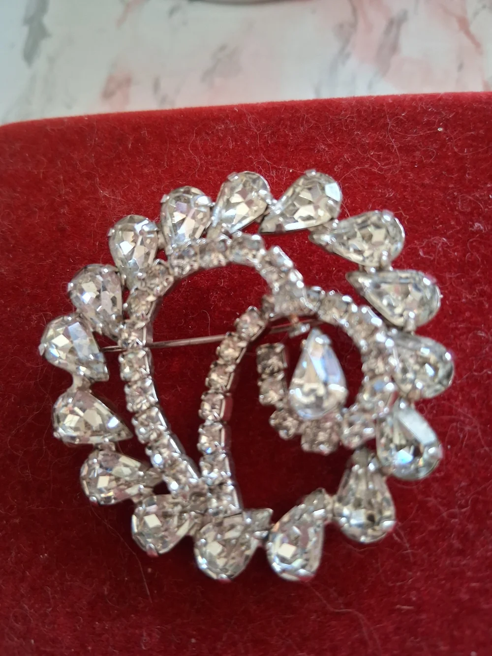 Source Unknown Clear Teardrop Swirl Rhinestone Brooch